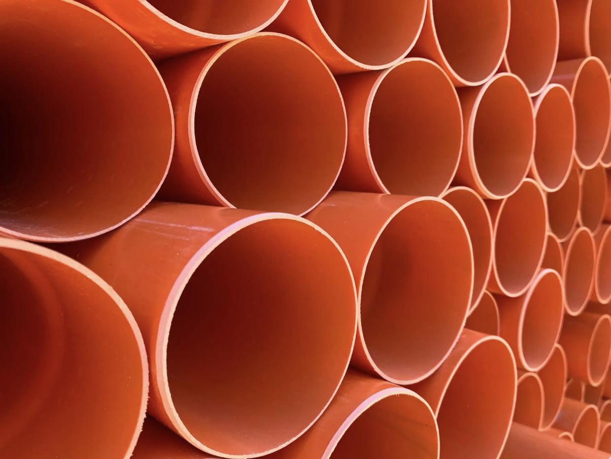 PVC sewer pipes stacked in the AN Plast yard